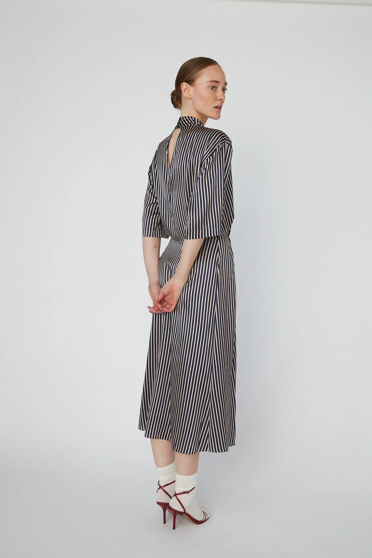 tight fitting parti striped dress Eve | Navy Pinstripe Plunge-Neckline Tailored Maxi Dress